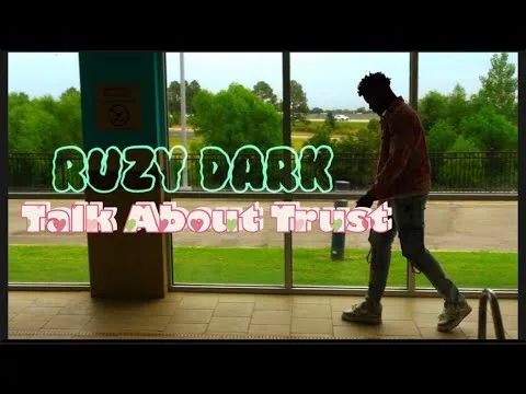 Scene from Ruzy Dark’s Talk About Trust official music video